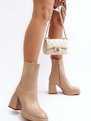 Heel boots Step in style