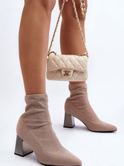 Heel boots Step in style