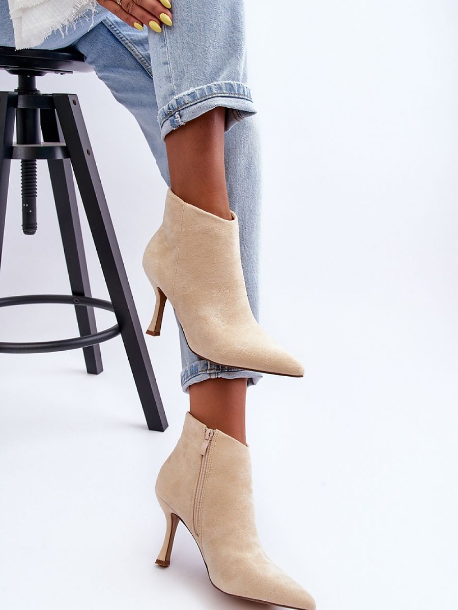 Heel boots Step in style