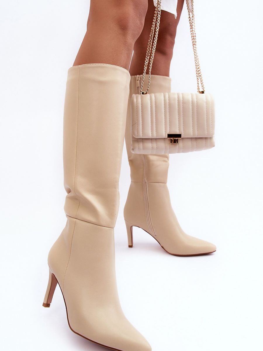 Heel boots Step in style